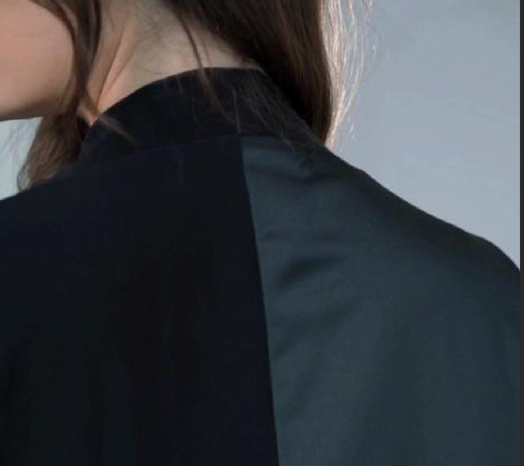 Detail of Qamra abaya tailoring and tonal fabric